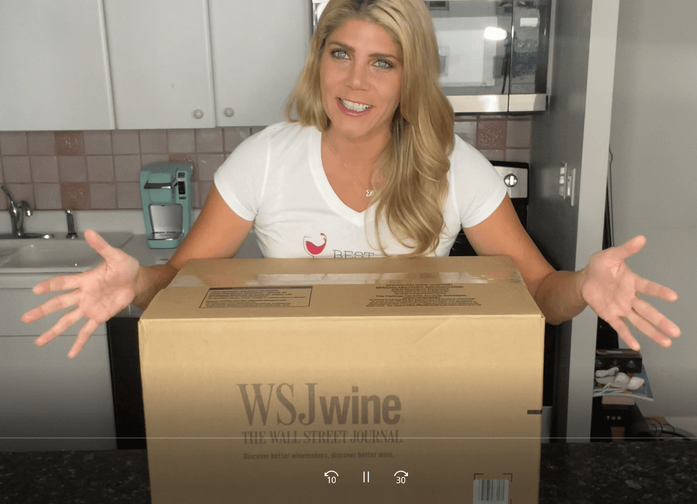 woman with wsj wine box